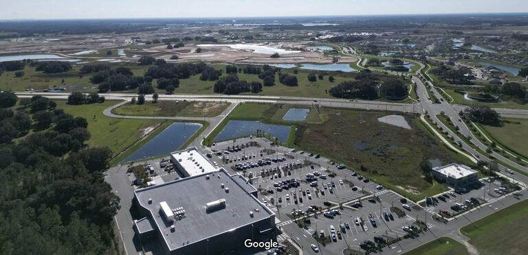 Aerial Photo of shopping area with Mirada in the distance